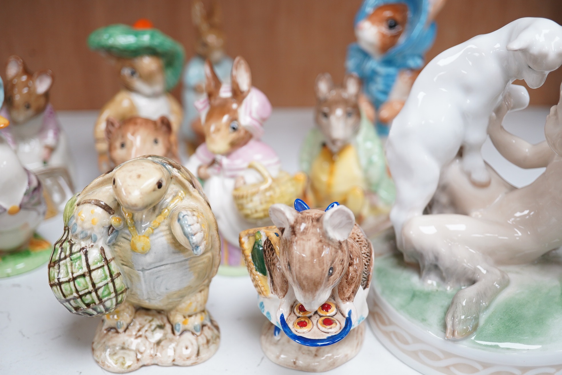 A collection Beswick ‘Bunnykins’ characters and two Royal Copenhagen ornaments (15). Tallest 13cm. Condition - good